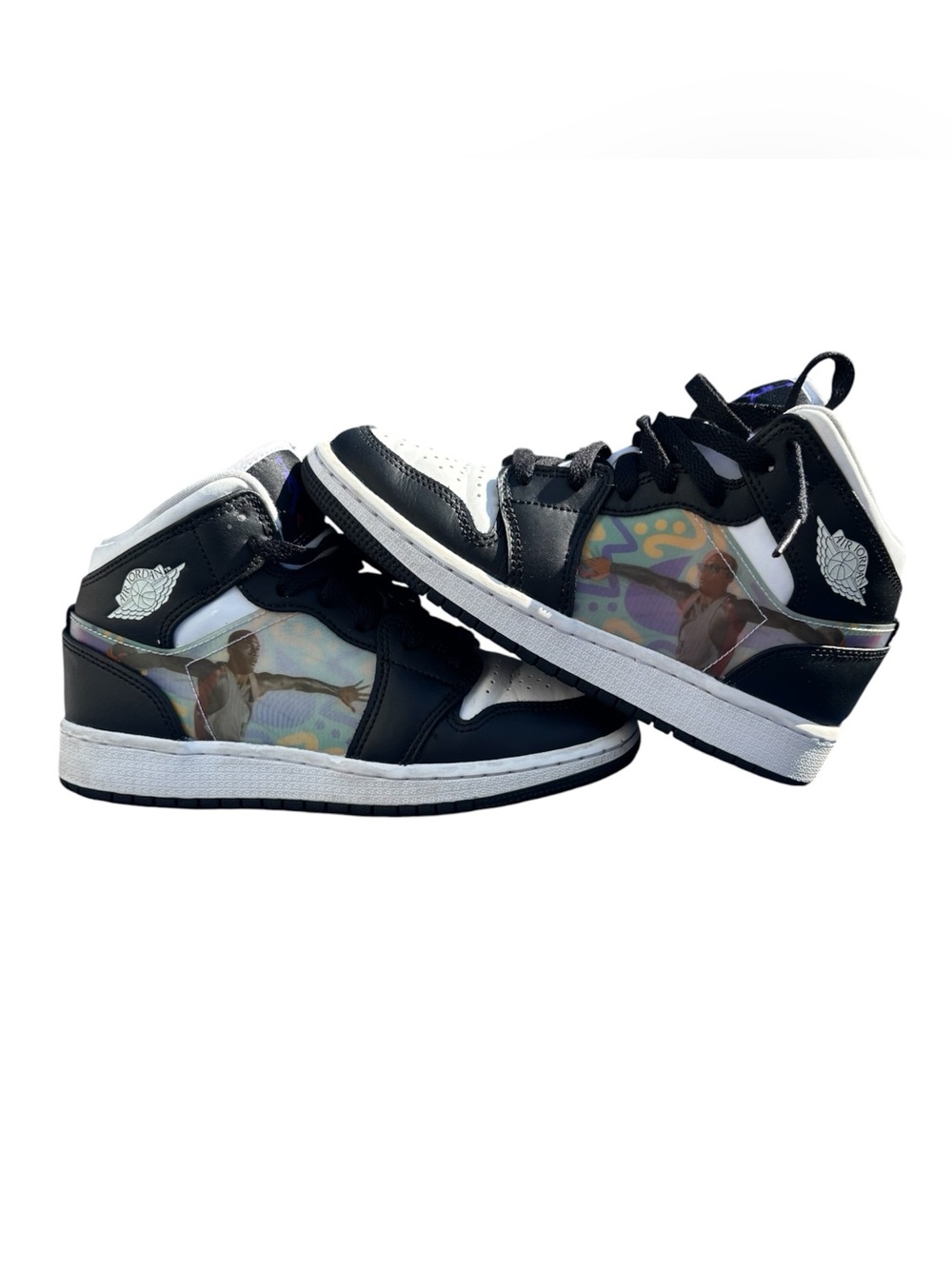 Jordan Kids Size 3.5Y  Mid Hologram. Black/White with Colorful Hologram side.
